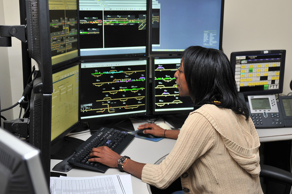 A dispatcher at Norfolk Southern’s division in Atlanta monitors train traffic at a Unified Train Control System (UTCS) dispatching console. The company will invest $75 million to expand its Atlanta office tower.