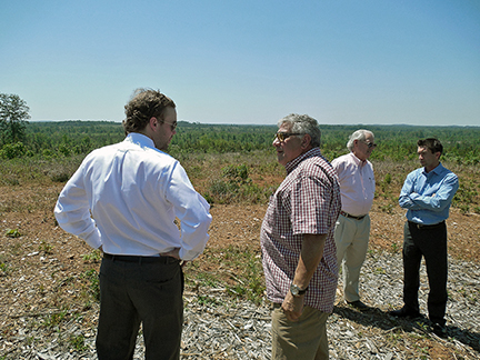 The 1,800-acre Chatham-Siler City Advanced Manufacturing Site has received certification from the North Carolina Department of Commerce’s certified sites program. Pictured is Matthew Randle of SB&D and owner Tim Booras at the site. 