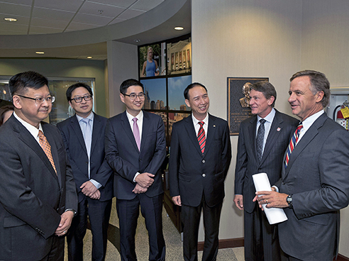 After investing a record $15 billion in the U.S. last year, the Rhodium Group reported in the spring quarter that Chinese investments are likely to total between $20 billion and $30 billion this year. Pictured with China-based Sinomax officials are Tennessee’s economic development Commissioner Randy Boyd and Gov. Bill Haslam at the company’s announcement. 