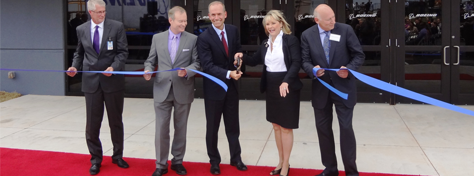 Gov. Mary Fallin and Boeing officials cut the ribbon on one of several new Boeing facilities in Oklahoma City. 