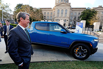 An understandably gleeful Georgia Gov. Brian Kemp announced the largest economic development project in state history — Irvine, California-based electric vehicle manufacturer Rivian plans to eventually employ more than 7,500 workers and produce up to 400,000 vehicles a year at its proposed  plant east of Atlanta.